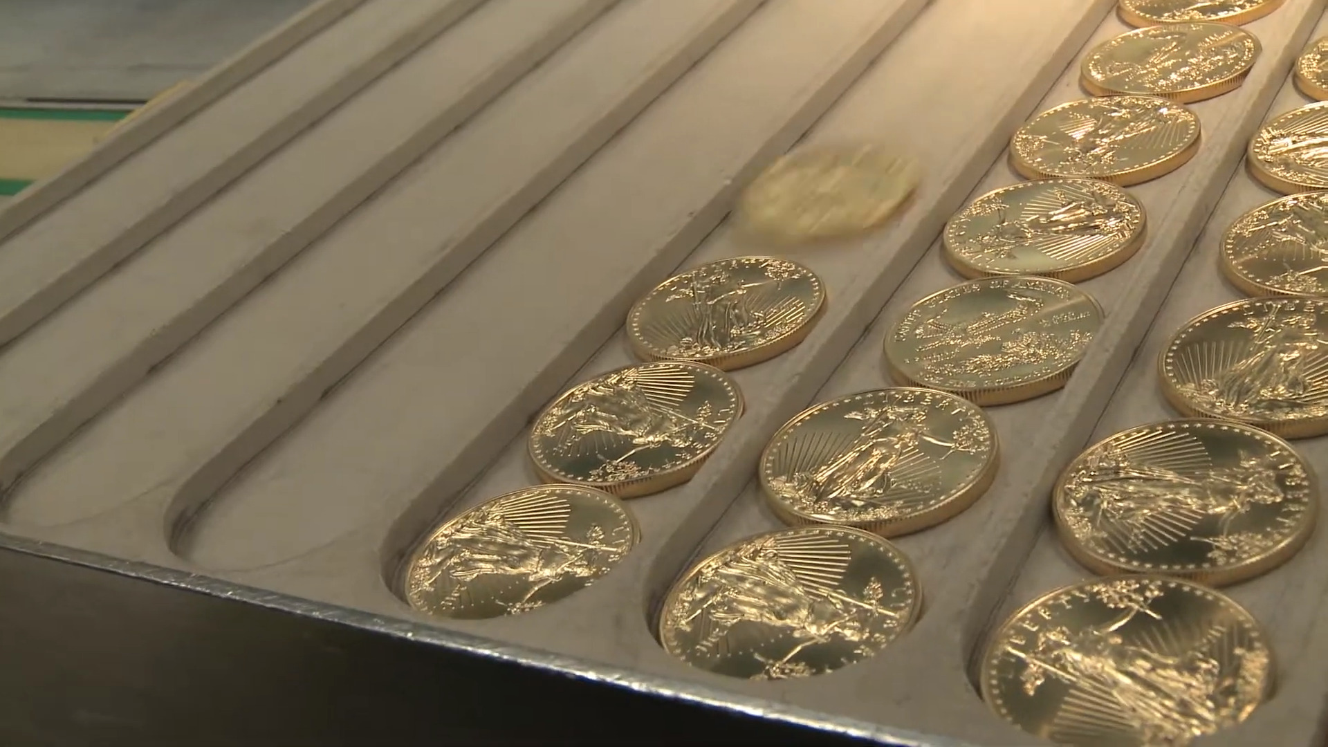 Newly struck American Gold Eagle coins